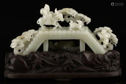 A HETIAN JADE HOLLOW RUYI ORNAMENT