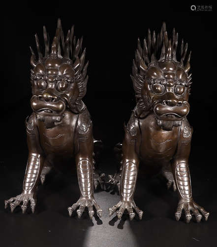 A PAIR OF BRONZE AUSPICIOUS BEASTS