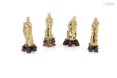 Four jade oriental figures