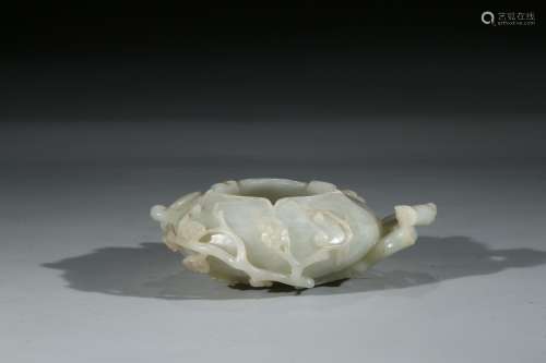 A WHITE JADE 'MAGPIE AND PLUM BLOSSOM' WASHER