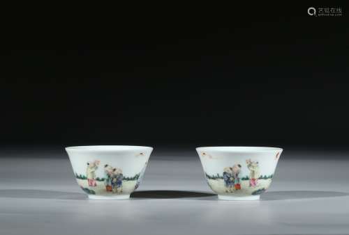 A PAIR OF FAMILLE ROSE 'BOYS' CUPS