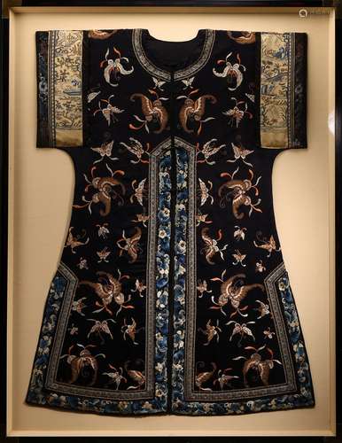 A FRAMED DARK BLUE GROUND 'BUTTERFLIES' SILK INFORMAL ROBE