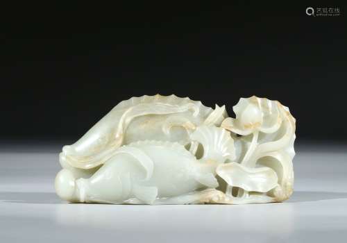 A LARGE WHITE JADE 'LOTUS AND FISH' CARVING