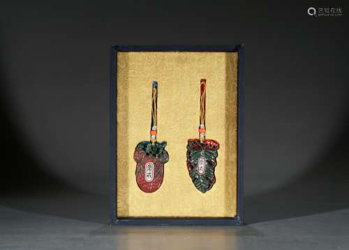 A SET OF TWO ZHAIJIE PENDANTS