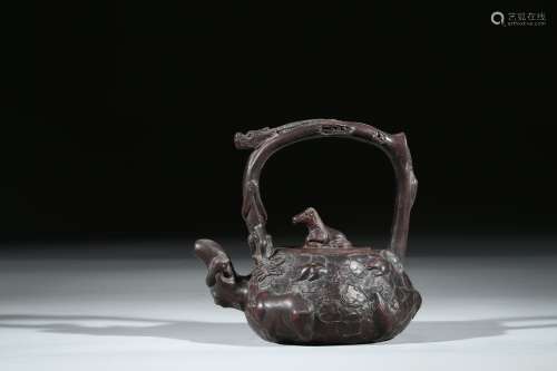 A YIXING 'TWELVE ZODIAC' TEAPOT