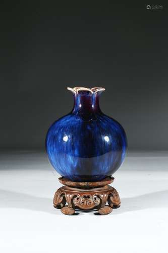 A FLAMBE GLAZED POMEGRANATE-FORM VASE