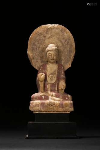 A PAINTED SEATED MARBLE CARVED BODHISATTVA