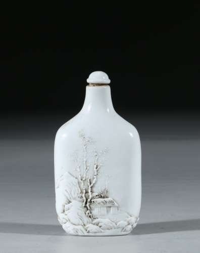 A WHITE GLAZED CARVED SNUFF BOTTLE