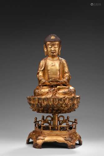 A GILT BRONZE FIGURE OF AMITABHA UPON STAND