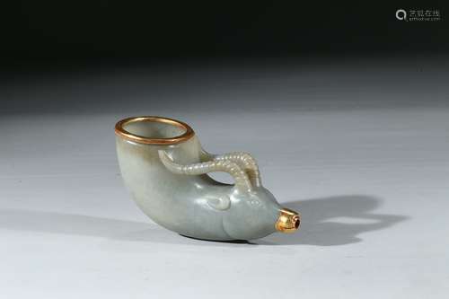 A CELADON JADE CARVED GILT 'RAM' HEAD CUP