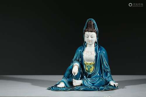 A BLUE GLAZE FIGURE OF GUANYIN