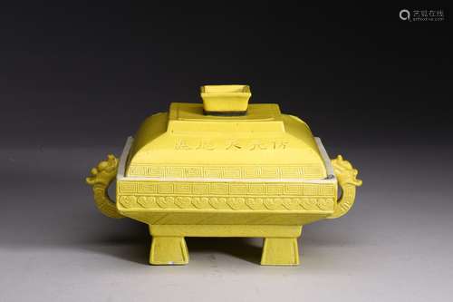 A YELLOW GLAZED ALTAR VESSEL WITH COVER