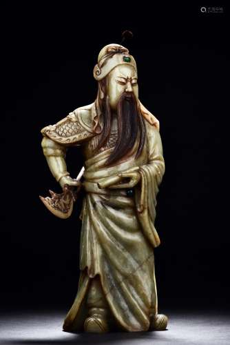 A LARGE SPINACH JADE CARVED GUAN GONG FIGURE