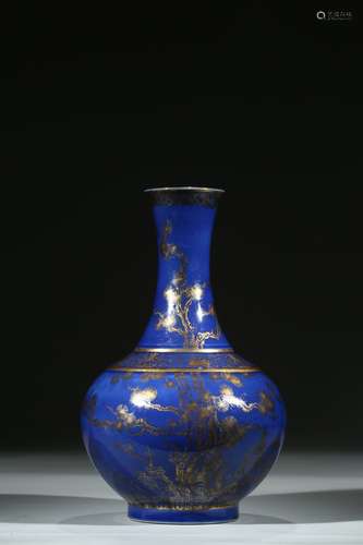 A BLUE GROUND GILT-DECORATED VASE