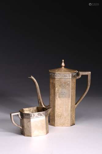 A SET OF TWO SILVER TEAPOT AND CUP