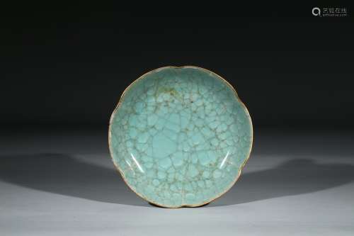 A CELADON GLAZED LOBED DISH