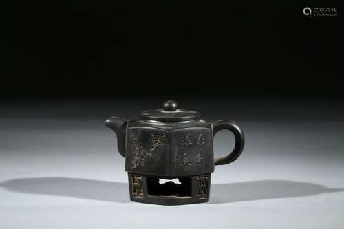 A YIXING INSCRIBED HEXAGONAL TEAPOT