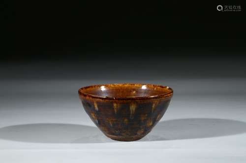 A BROWN GLAZED BOWL