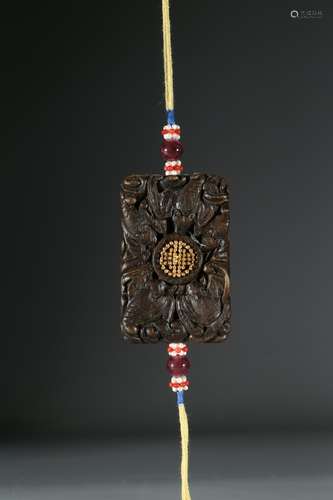 A GOLD-BEAD INLAID AGARWOOD PLAQUE