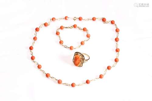A GROUP OF THREE CORAL NECKLACE, BRACELET, AND RING