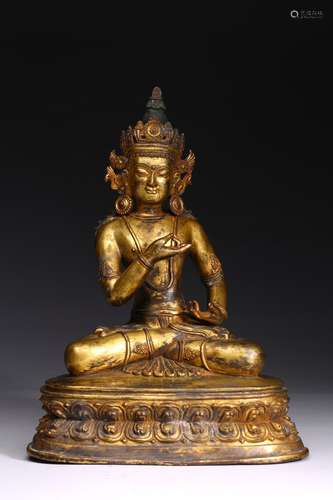 A GILT BRONZE FIGURE OF BODHISATTVA