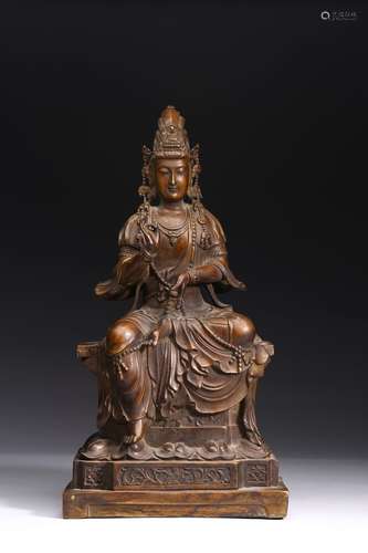 A BRONZE CAST FIGURE OF SEATED BODHISATTVA