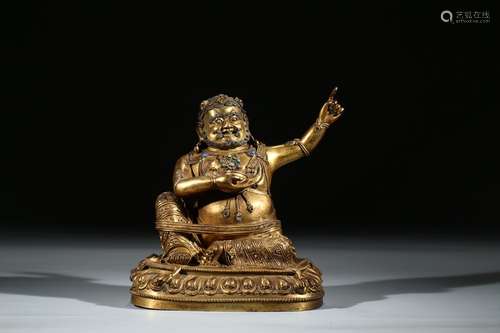 A GILT BRONZE FIGURE OF MAHASIDDHA VIRUPA