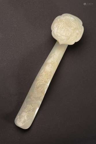 A WHITE JADE RELIEF CARVED 'FIGURES AND LANDSCAPE' RUYI SCEPTER