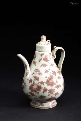 AN UNDERGLAZED 'FLOWERS' RED TEAPOT