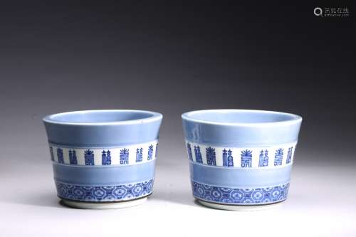 A PAIR OF BLUE AND WHITE 'FU SHOU' JARDINIERES