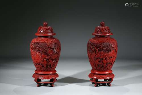 A PAIR OF CINNABAR LACQUER 'LANDSCAPE' JARS