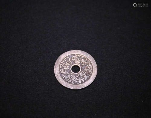 A SILVER EIGHT IMMORTALS CAVED COIN