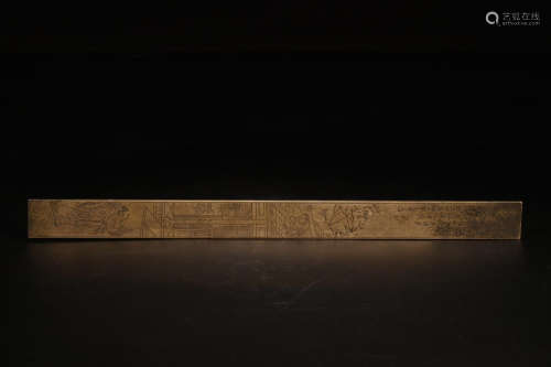 A COPPER RULER WITH POETRY CARVED