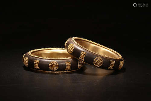 PAIR OF CHENXIANG WOOD BRACELETS