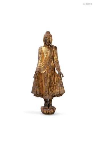 Statue de bouddha debout en bois laqué or les bras…