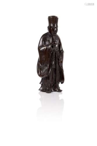 Statuette en bronze à patine brune de dignitaire d…