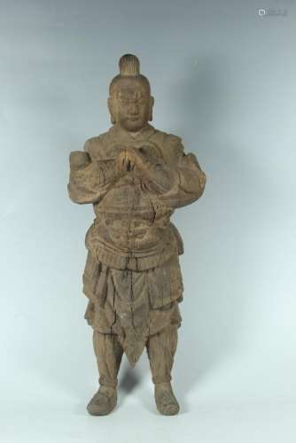 A CARVED WOOD GUARDIAN.ANTIQUE