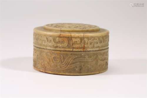 A CARVED SOAP STONE BOX AND COVER.