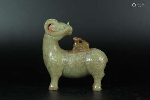 A CARVED YELLOW-JADE SHEEP.ANTIQUE