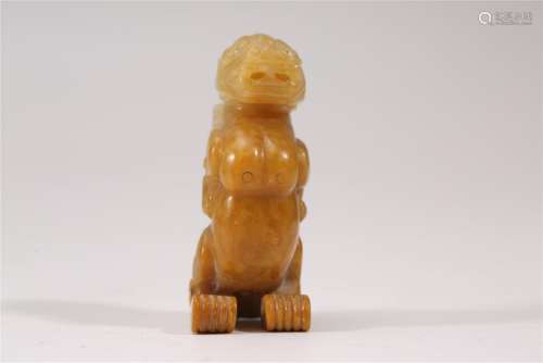 A CARVED YELLOW JADE BEAST.ANTIQUE
