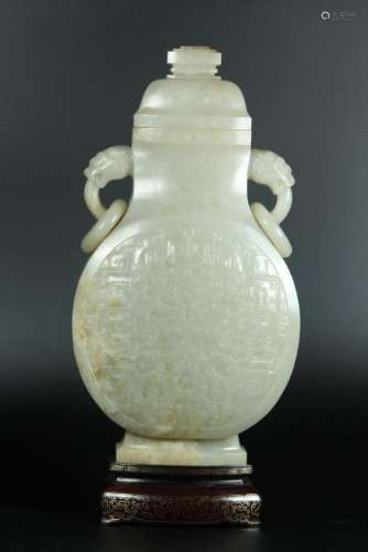 A WHITE JADE CARVING OF VASE AND COVER.QING DYNASTY