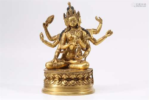 A GILT-BRONZE FIGURE OF USHNISHAVIJAYA.QING DYNASTY