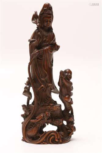 A CARVED HUANGYANGMU GUANYIN AND BOY.ANTIQUE