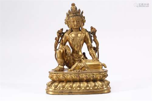 A GILT-BRONZE FIGURE OF GUANYIN.MING DYNASTY