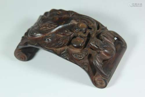 A CARVED AGALLOCH WOOD PENREST.ANTIQUE