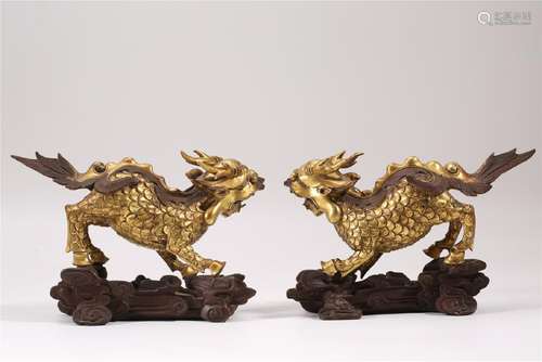 A PAIR OF GILT-BRONZE QILIN.ANTIQUE