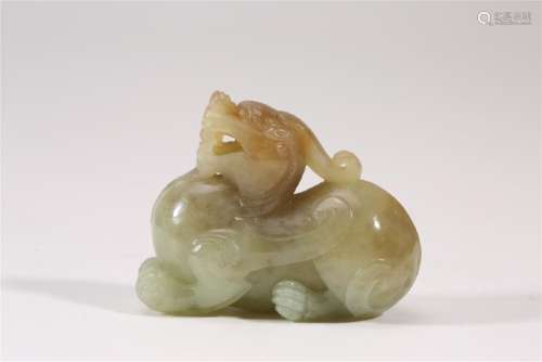 A CARVED WHITE JADE BEAST.QING DYNASTY