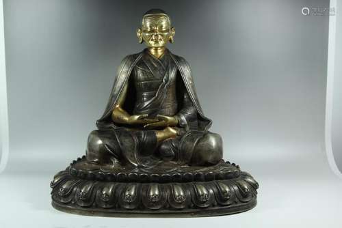 A GILT-BRONZE FIGURE OF GURU.ANTIQUE