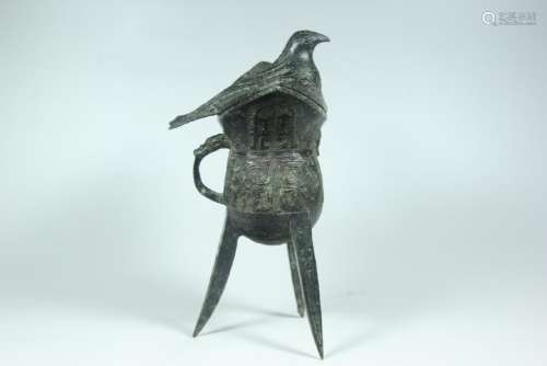 A BRONZE RITUAL WINE VESSEL.ANTIQUE