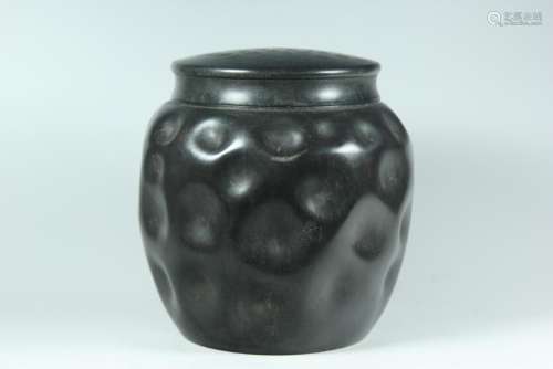 A CARVED TIN TEA JAR AND COVER.ANTIQUE